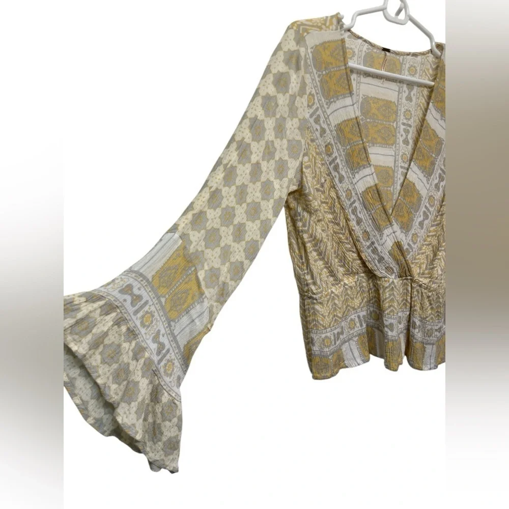 Free People Rosalie Bell Sleeve Faux Wrap Top in Antique Combo